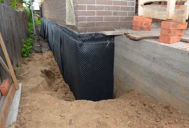 Happy homeowners after waterproofing job in Rio